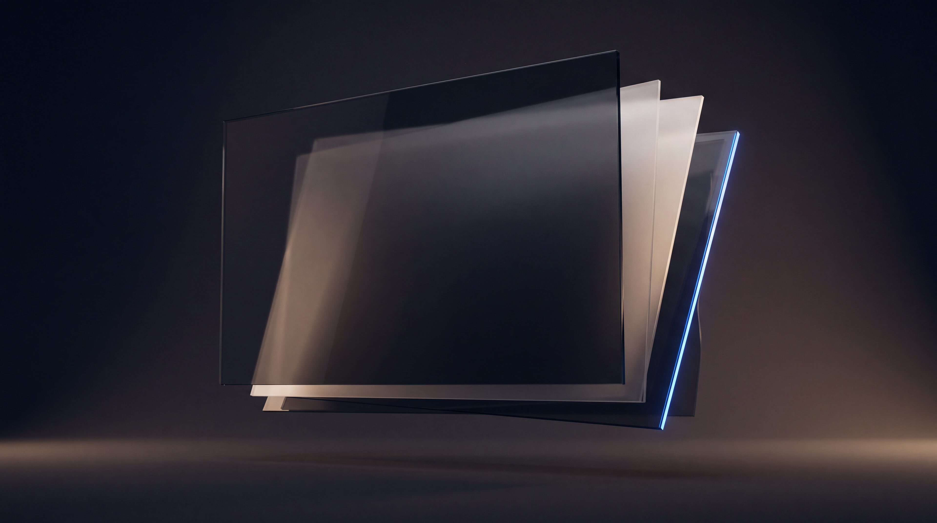 背後に半透明のシートが重なる、浮かぶ1枚の暗いガラスパネル